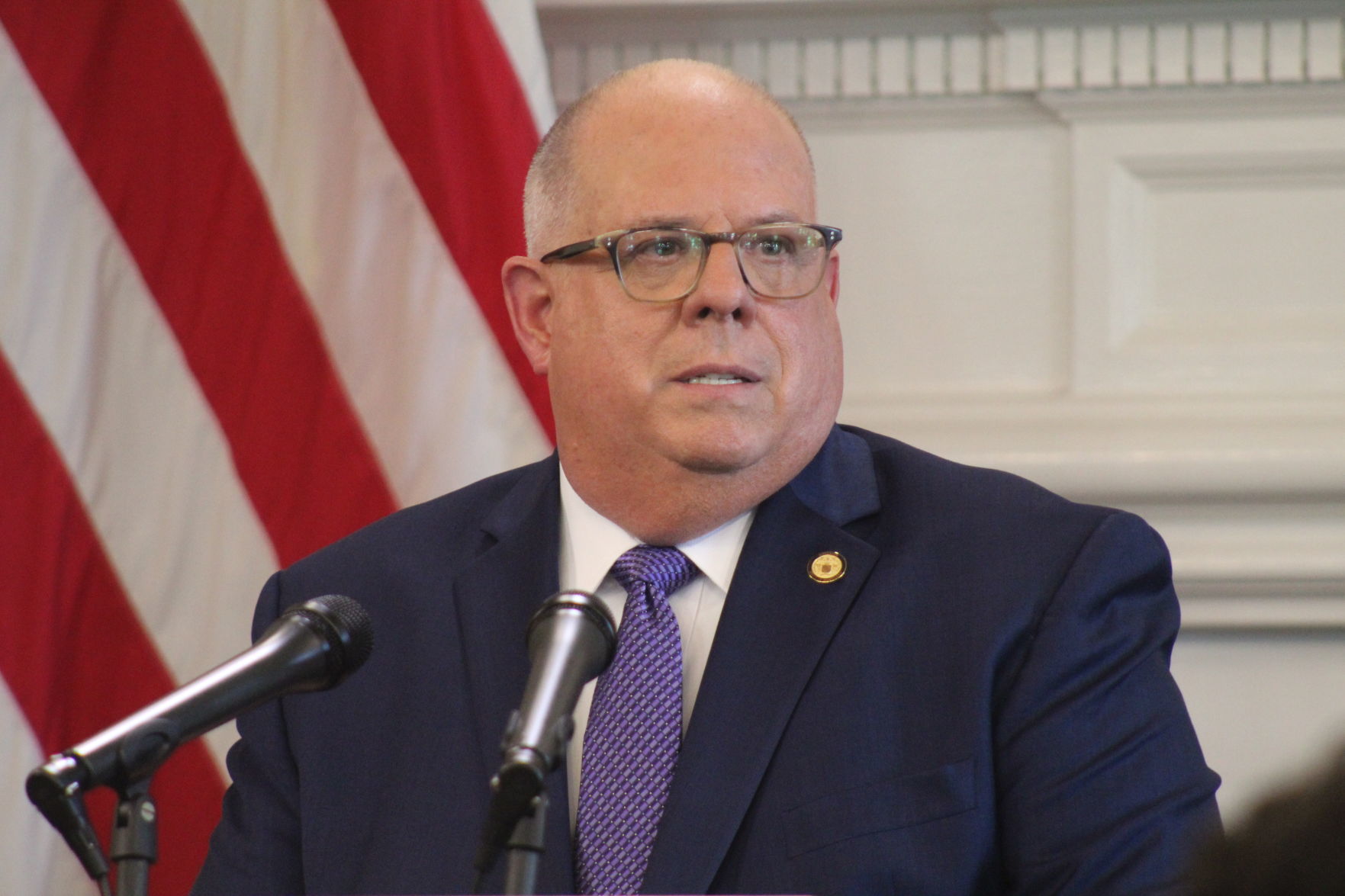 Hogan eases limits on restaurants, youth sports